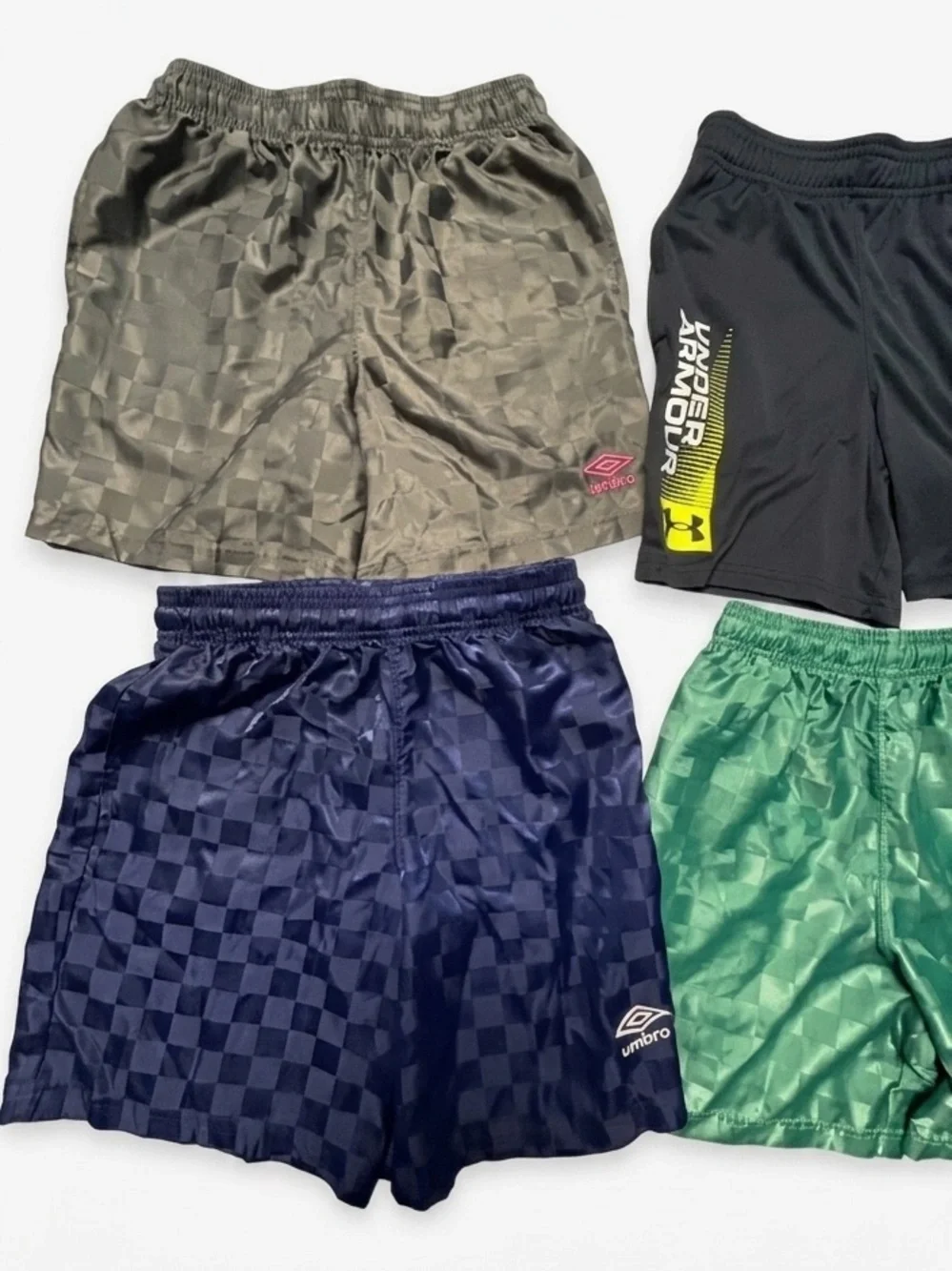 BUNDLE of 4 Umbro boys' athletic  shorts with a embossed retro checkered pattern